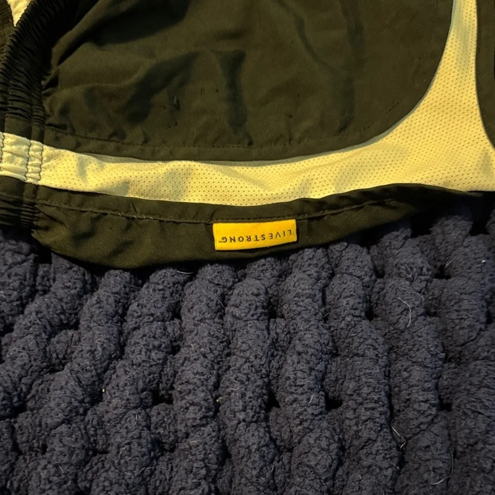 Nike Women's Black Shorts with Yellow and White Accents